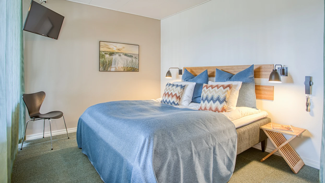 Sengeområde i juniorsuite
